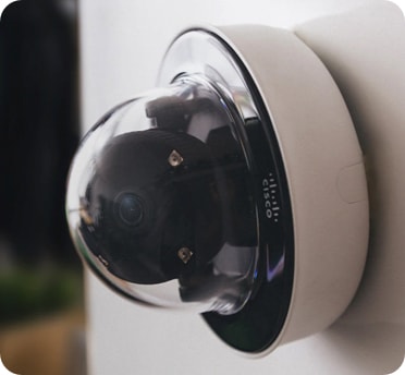 Cisco Meraki Smart Camera Mounted on an office wall